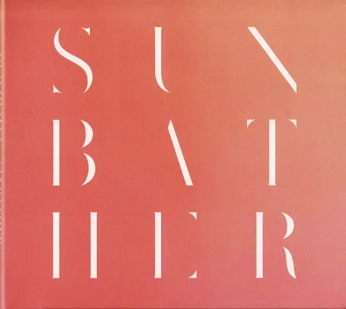 Original salmon-pink Sunbather album cover by Deafheaven with widely spaced white letterforms